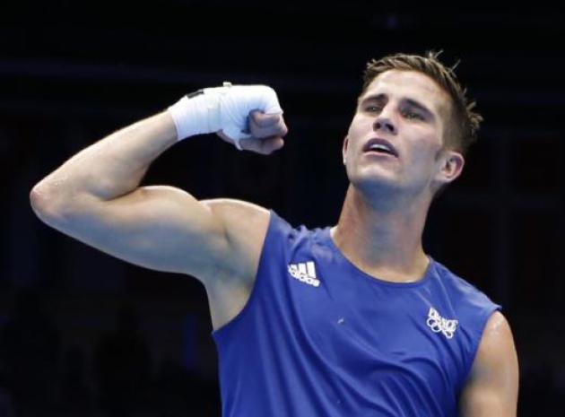 France's Alexis Vastine await the ruling announcing the winner after his men's welter (69kg) quarter-final boxing match against Ukraine's Taras Shelestyuk at the London Olympic Games in this August 7, 2012 file photo. French President Francois Hollande's office confirmed on March 10, 2015 that eight French nationals were among 10 killed in an accident involving two helicopters in Argentina. The Elysee Palace said in a statement that famed sailor Florence Arthaud, Olympic swimmer Camille Muffat and boxer Vastine were among the dead. It added that the accident happened during the filming of a TV programme for the TF1 TV channel. (REUTERS/Murad Sezer)