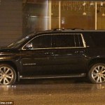 Damage: The Chevy Suburban is pictured with two flat tires at the side of the road in West Hollywood © DailyMail